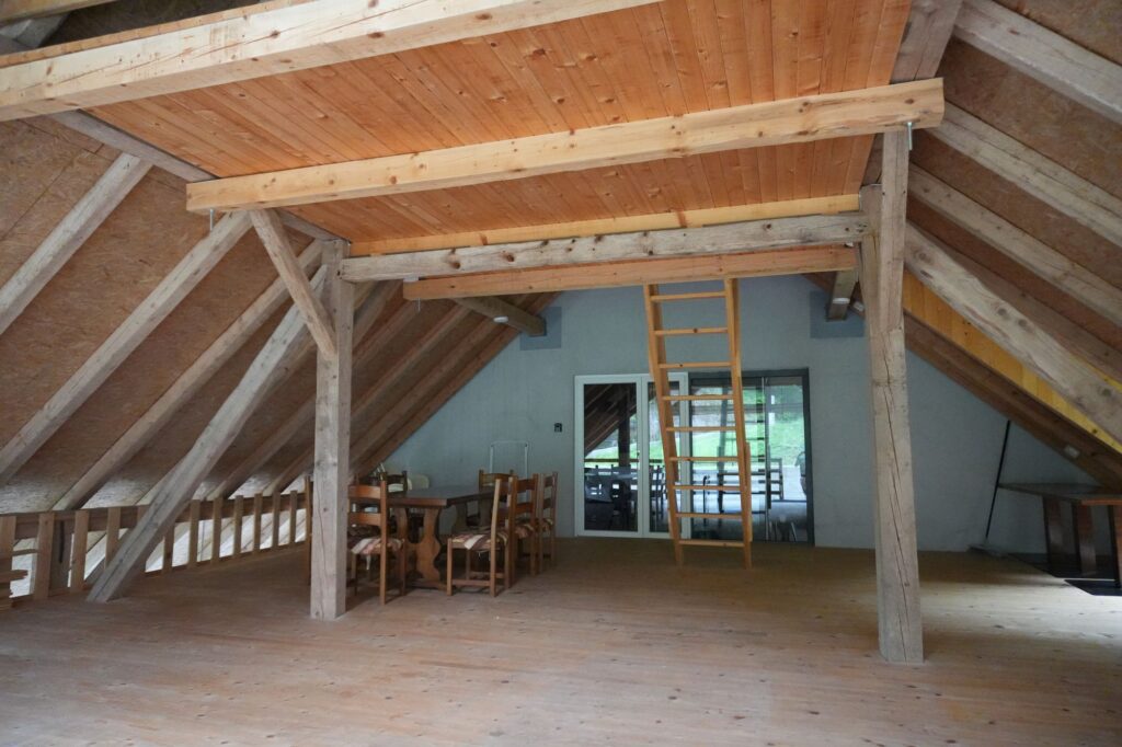 Timber loft in the old barn at Forest Farmstay